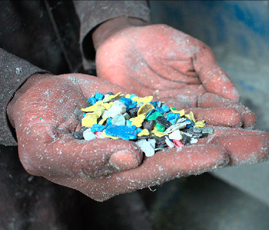 Hands holding plastic pieces