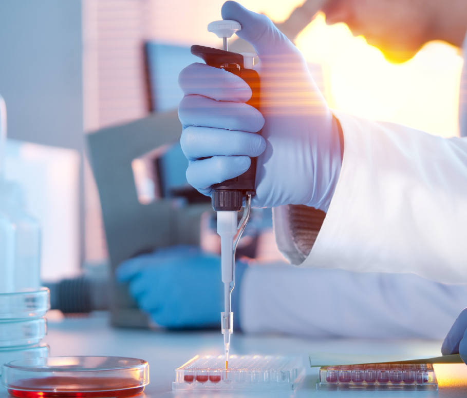  scientist working in a lab with a pipette